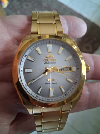 Relógio Orient dourado automático