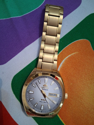 Relógio Orient dourado automático