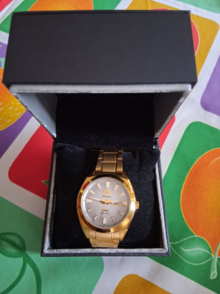 Relógio Orient dourado automático